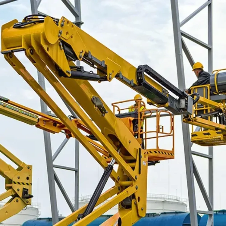 Mężczyzna używający podestu roboczego - praca na wysokości